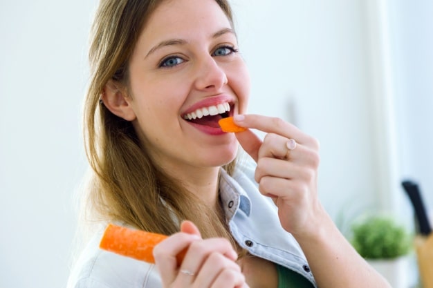 Woman eating Bioscor International